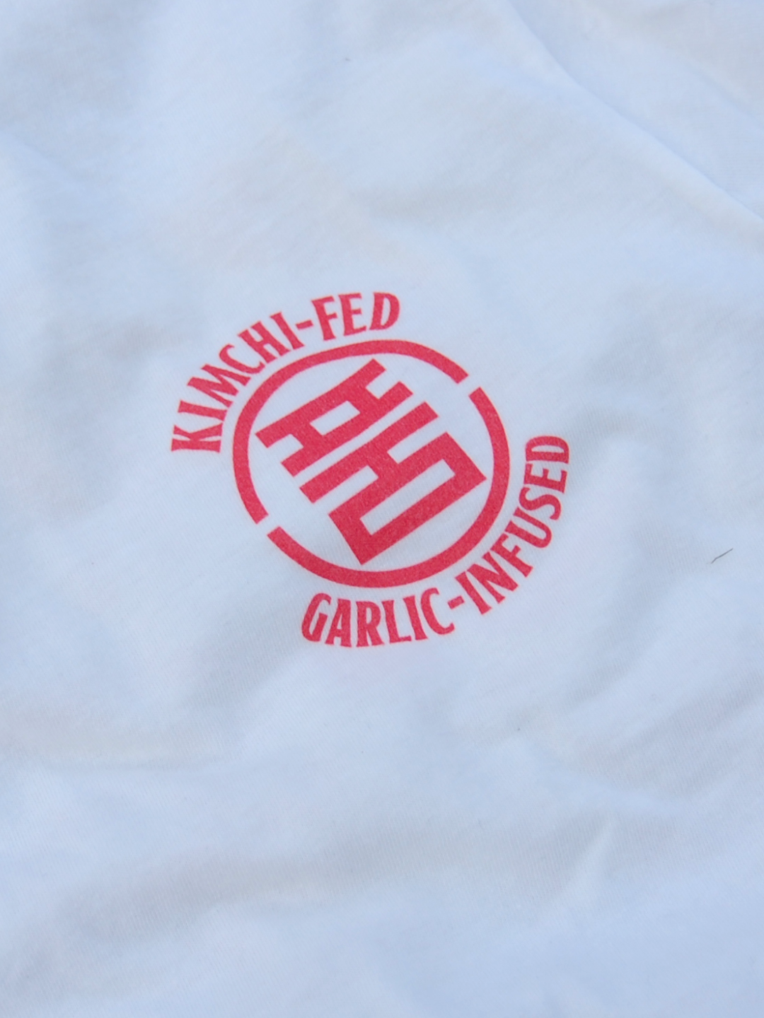KIMCHI-FED, GARLIC-INFUSED T-SHIRT